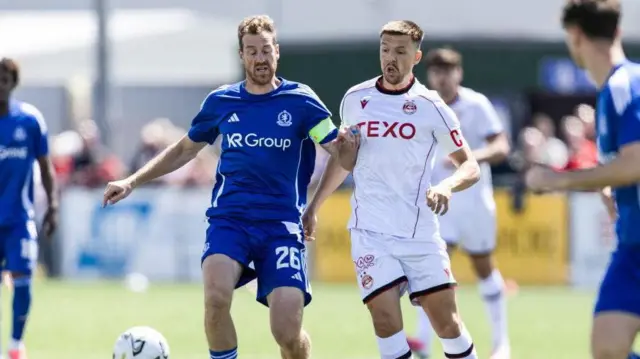 Aberdeen's Brad Lyons (R) and Cove Rangers' Jordan White in action during a pre-season friendly match between Cove Rangers v Aberdeen at the Balmoral Stadium, on June 27, 2026, in Aberdeen, Scotland