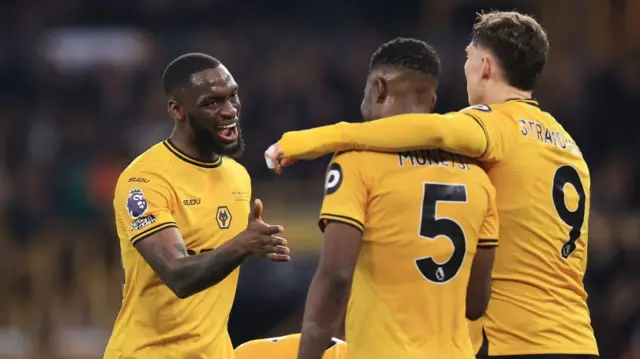 Marshall Munetsi of Wolverhampton Wanderers is congratulated by teammate Toti Gomes