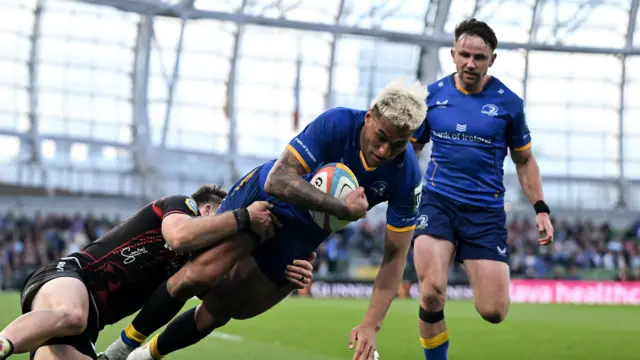 Rieko Ioane runs in a try for Leinster