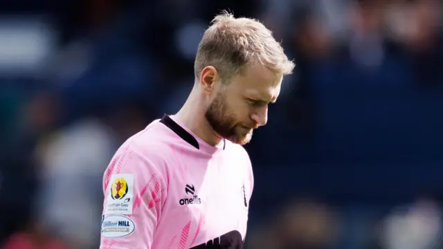 Falkirk goalkeeper Scott Bain looks dejected