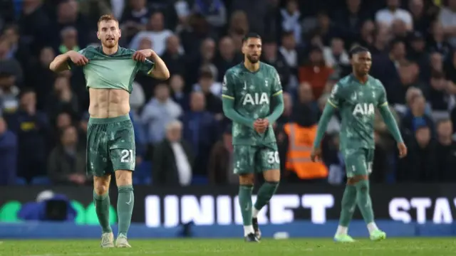 Tottenham players looks dejected after full-time