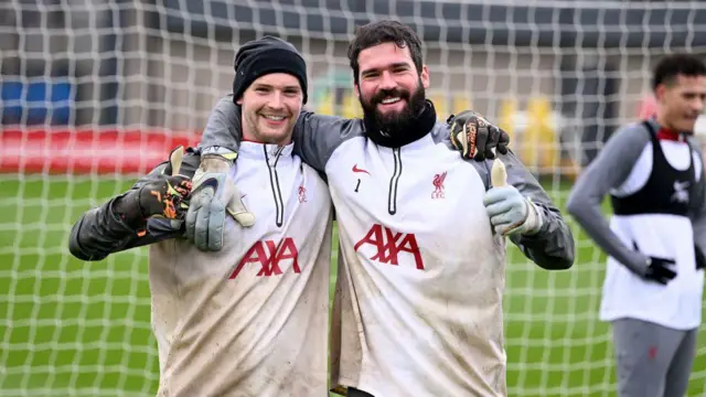 Alisson and Caoimhin Kelleher of Liverpool during a training session