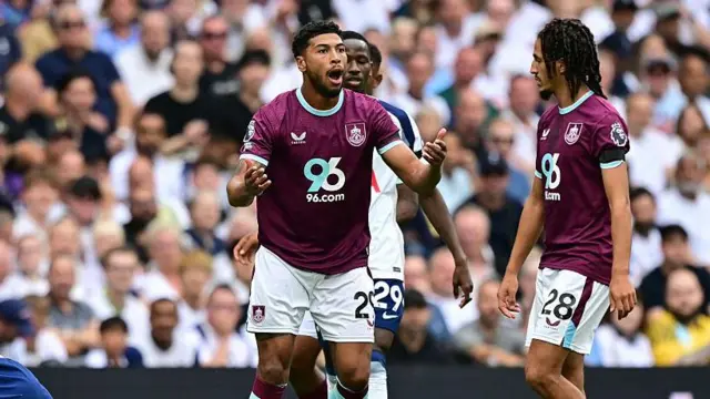 Burnley's English midfielder #29 Josh Laurent (C) appeals after conceding a free kick during the English Premier League football match between Tottenham Hotspur and Burnley at the Tottenham Hotspur Stadium