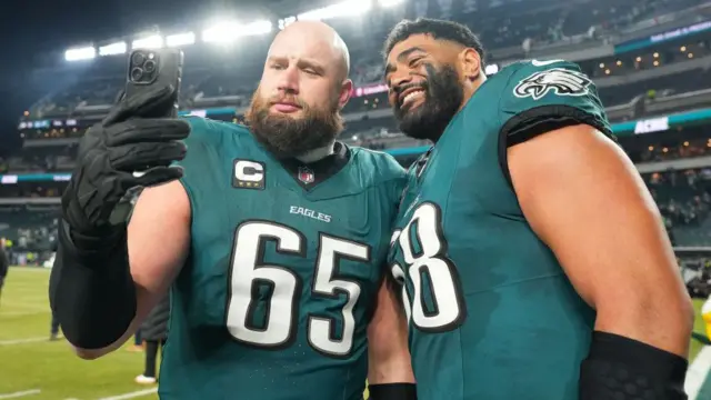 Lane Johnson, left, with Eagles team-mate Jordan Mailata