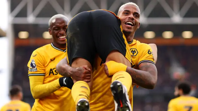 Wolves players celebrate goal against Fulham