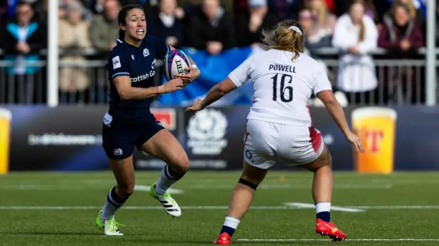 Scotland's Rhona Lloyd and England's Connie Powell in action during a Guinness Women's Six Nations match between Scotland and England at Hive Stadium