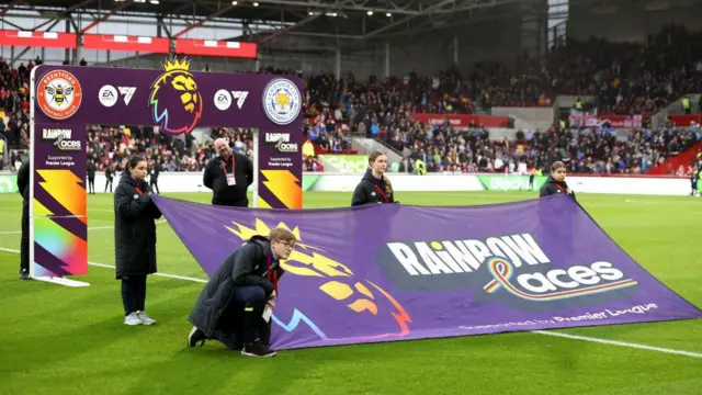 A general view of the Rainbow Laces handshake board and banner prior to the Premier League match between Brentford FC and Leicester City FC at Gtech Community Stadium