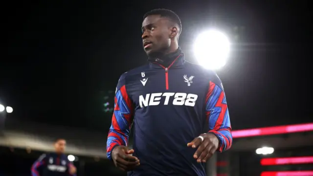 Marc Guehi of Crystal Palace warms up prior to the Premier League match between Crystal Palace FC and Arsenal FC at Selhurst Park on December 21, 2024