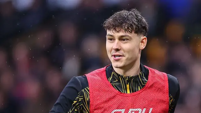 Jorgen Strand Larsen smiles during a warm up