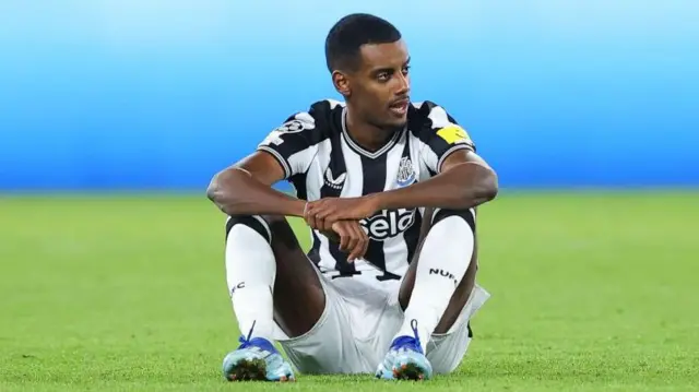 Alexander Isak of Newcastle United looks dejected