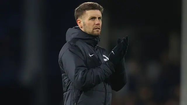 Fabian Hurzeler manager / head coach of Brighton and Hove Albion applauds the fans 