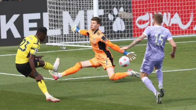 Illan Meslier saves from Ismaila Sarr