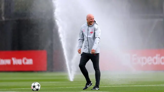 Arne Slot, Manager of Liverpool, looks on during the UEFA Champions League 2024/25 League Phase MD2 training session at AXA Melwood Training Centre