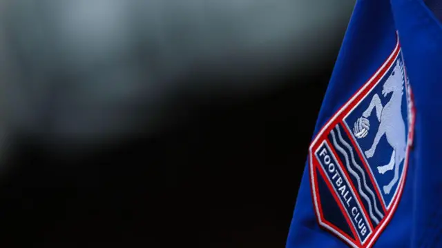 Ipswich Town's club badge on a corner flag close-up