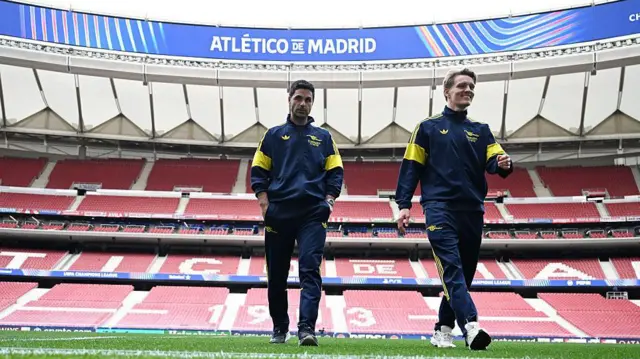 Mikel Arteta and Martin Odegaard in Atletico Madrid's empty stadium