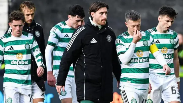Celtic players look disappointed after losing to Hearts
