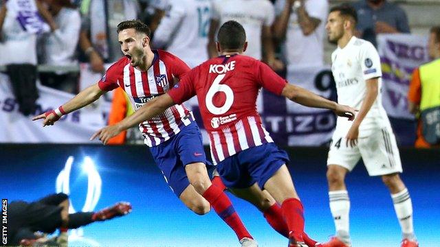 Atletico Madrid's Saul and Koke celebrate