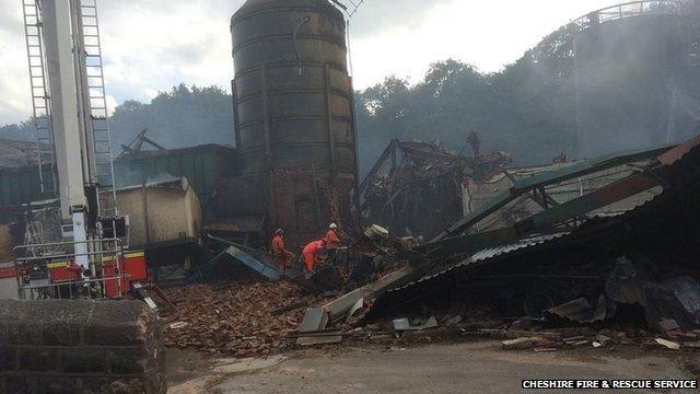 Emergency services searching through the rubble