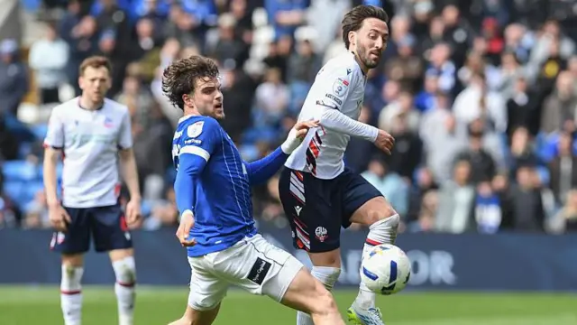 Cardiff's Ollie Tanner and Bolton's Josh Sheehan compete during the most recent meeting of the two clubs 