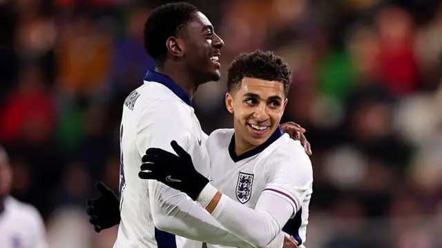 Divin Mubama celebrates with England U21 team-mate Rico Lewis