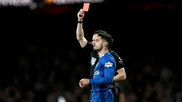  Pedro Neto is shown a red card by Referee Darren England