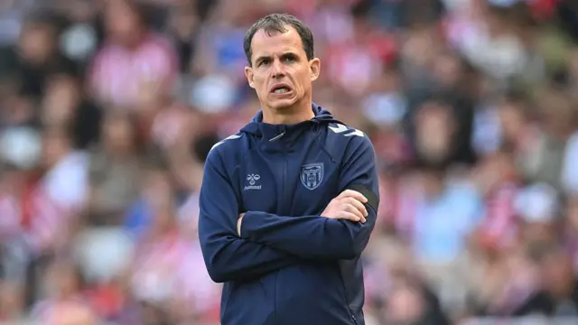 Sunderland head coach Regis Le Bris looks on