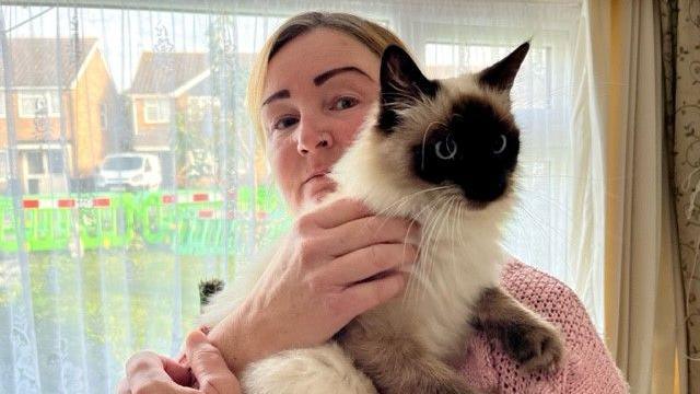 Teddy the cat and owner Teresa Giles