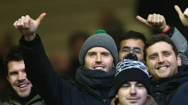 Michael Carrick watches Manchester United versus Liverpool in the away end in 2016