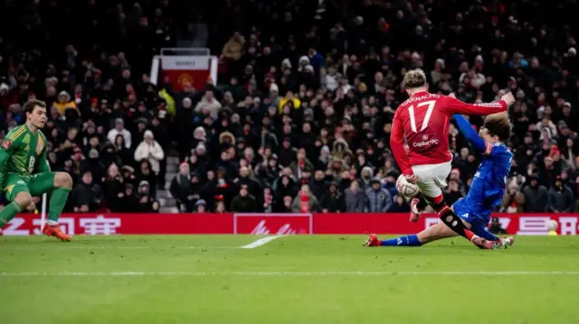 Alejandro Garnacho takes a shot during Manchester United's game with Leicester