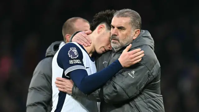 Ange Postecoglou hugs Archie Gray