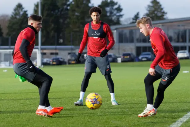 Harrison Ashby in Swansea training with Bashir Humphreys and Ollie Cooper