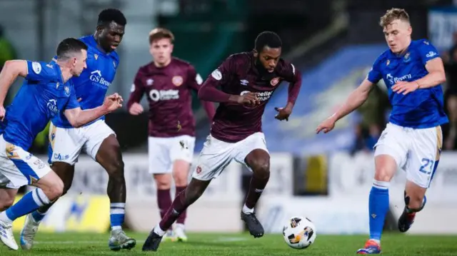 Hearts' Beni Baningime (centre) against St Johnstone