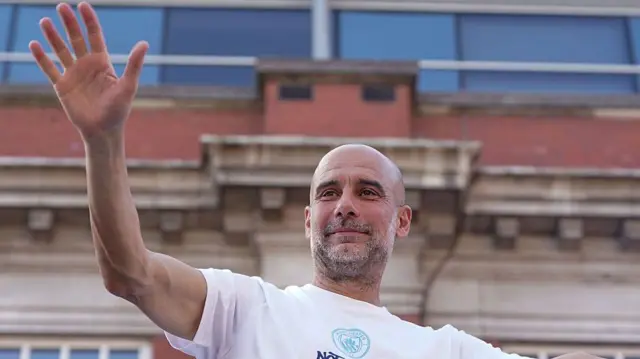 Pep Guardiola waving