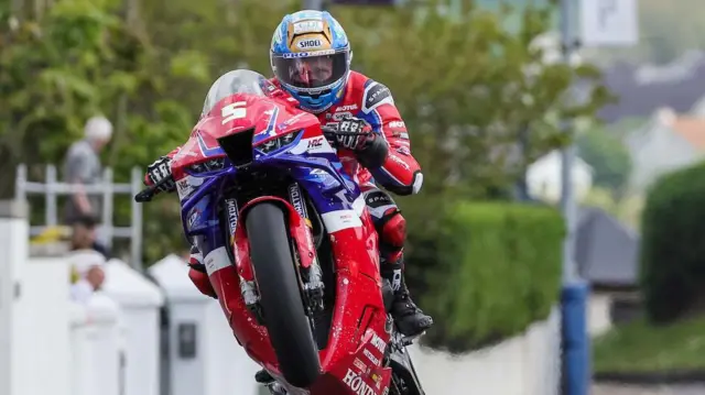 Dean Harrison gets airborne at the 2024 North West 200