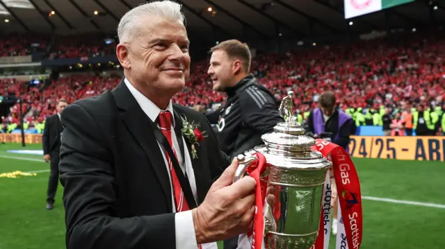 Aberdeen chairman Dave Cormack with the Scottish Cup trophy