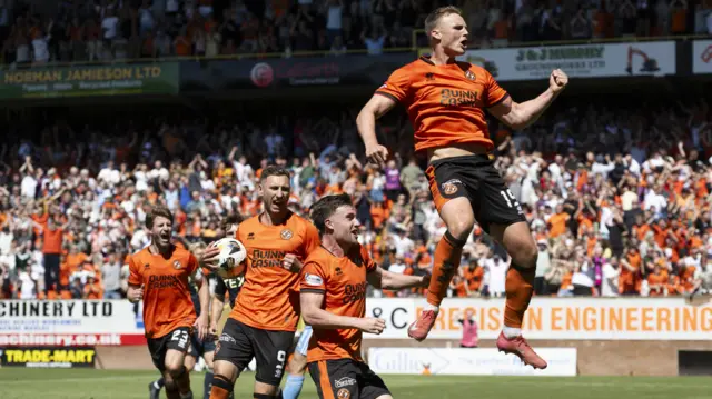 Dundee United's Sam Dalby (R) celebrates after scoring to make it 2-1 during a William Hill Premiership match between Dundee United and Aberdeen at the CalForth Construction Arena at Tannadice Park