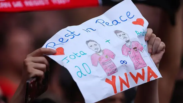A hand-drawn poster saying Rest In Peace with pictures of Jota and Silva
