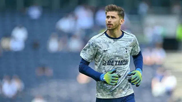 Guglielmo Vicario of Tottenham Hotspur warms up before the Premier League match between Tottenham Hotspur and Everton at Tottenham Hotspur Stadium on May 24
