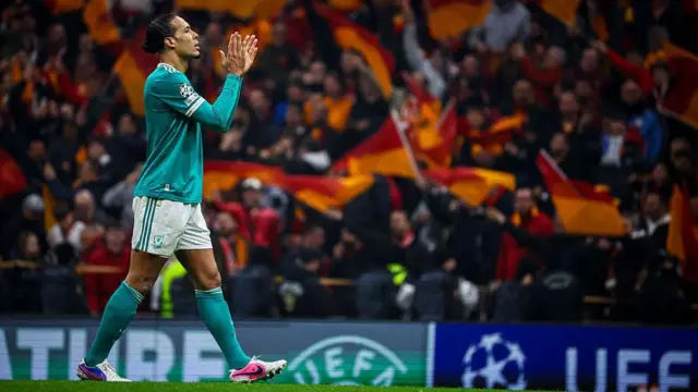 Virgil van Dijk of Liverpool applauds the fans