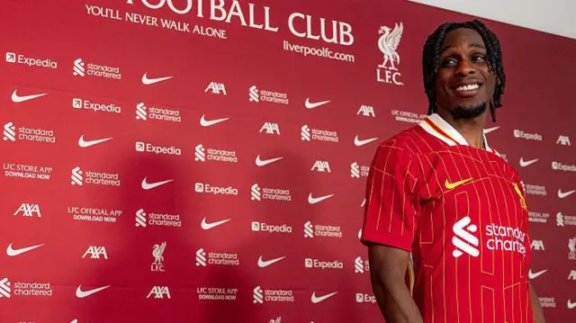 Jeremie Frimpong wearing a Liverpool shirt