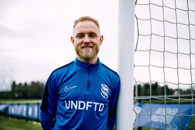 Alex Pritchard in a Birmingham City tracksuit