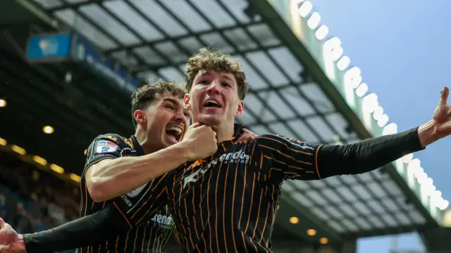 Lewis Koumas celebrating