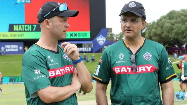 Jonathan Trott (left) talks to Sourav Ganguly while Pretoria Capitals head coach