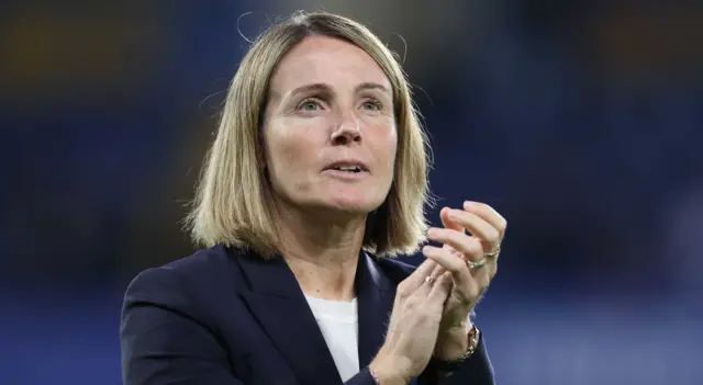 Sonia Bompastor applauds after Chelsea beat Manchester City