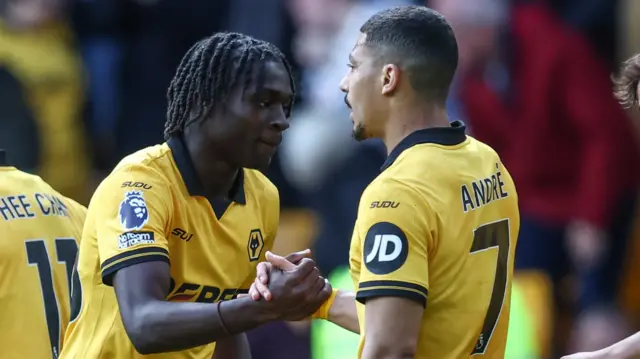 Wolves' Matheus Mane with team-mate Andre
