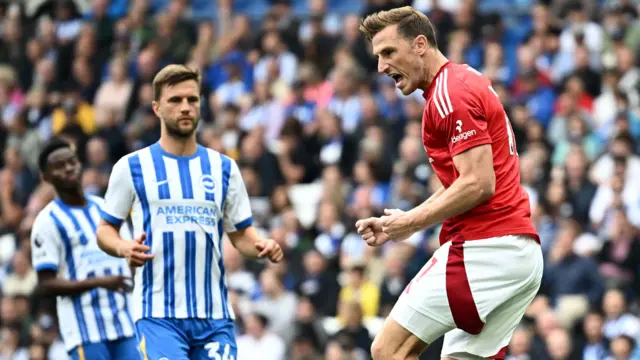 Chris Wood celebrates scoring against Brighton