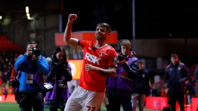 Charlie Kelman fist pumping to the crowd