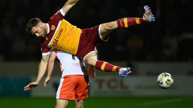 Stephen O'Donnell challenges for high ball