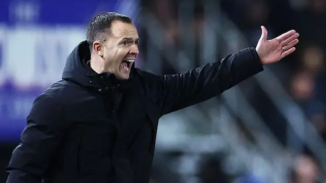 Chris Davies shouts and points at his players during Birmingham City's game against Southampton 