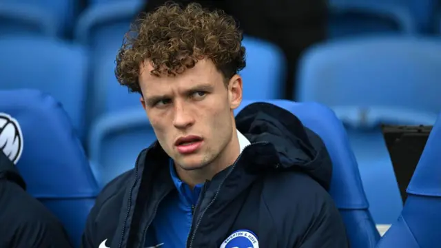 Mats Wieffer of Brighton & Hove Albion sits on the sub's bench prior to the Premier League match between Brighton & Hove Albion FC and Crystal Palace FC at Amex Stadium on December 15, 2024